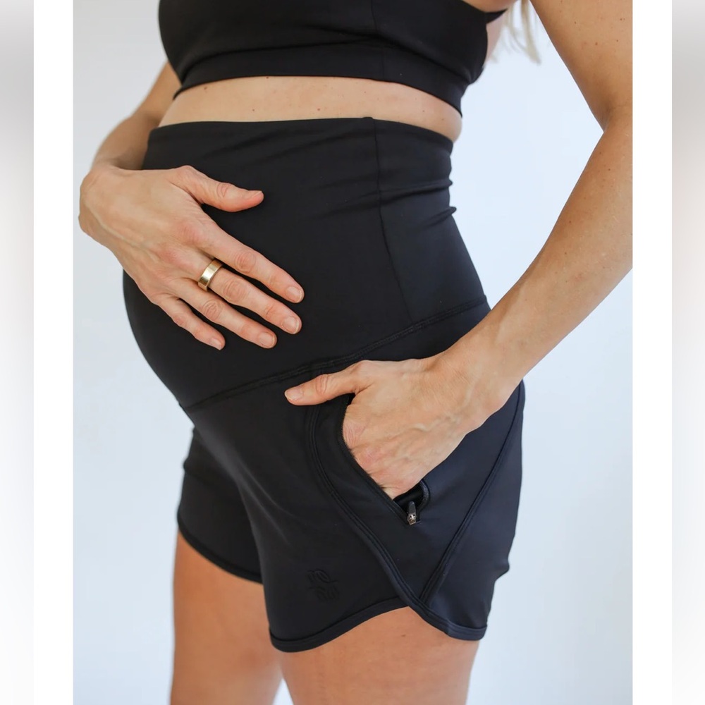 Movemama maternity athletic  shorts with zippered pockets full belly panel EUC